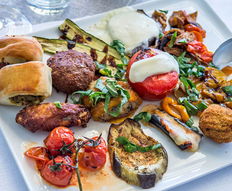 Plate of delicious vegetarian dish served on the yacht